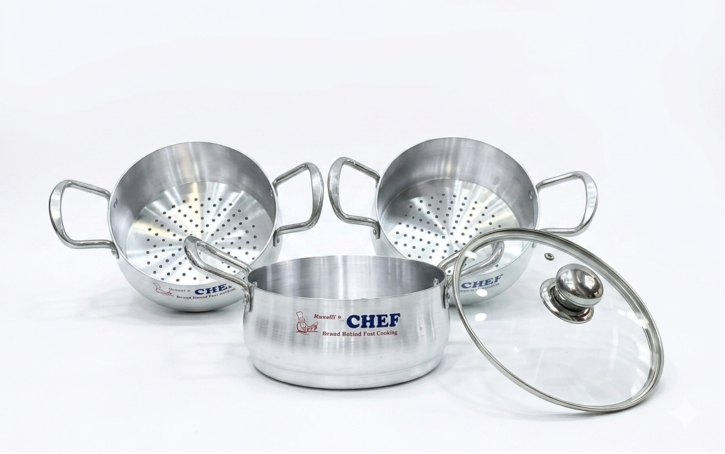 Set of aluminum cookware with lids on a white background